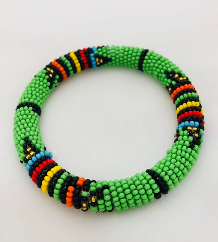 Maasai Beaded Elastic Tassel Wrap Bracelet – Blush/Taupe/Gold | Design  Menagerie
